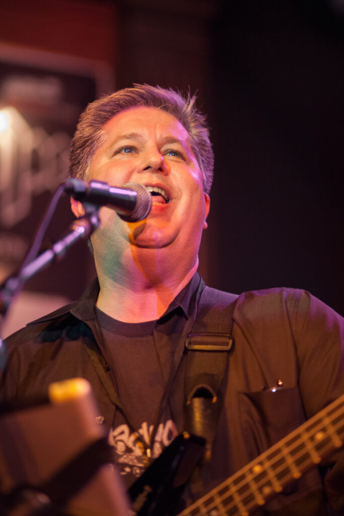 Chuck La Tournous singing and playing at Cirque du Mac 11.